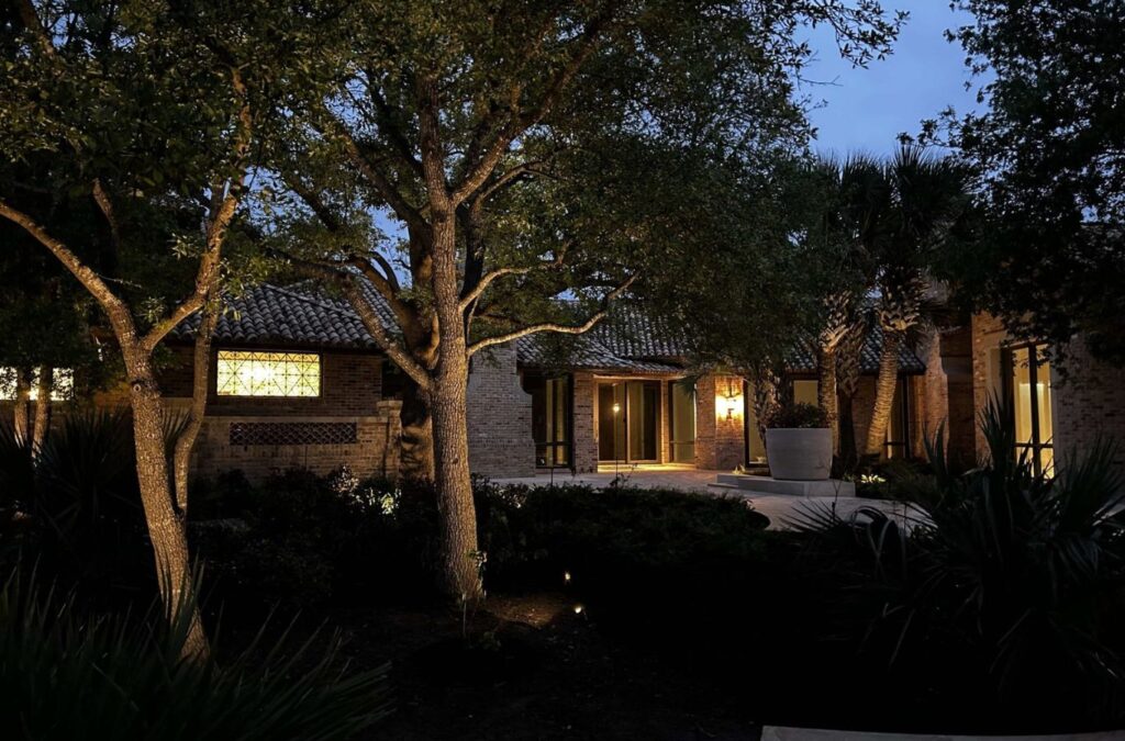 A Rockin’ M Outdoor Lighting expert designing custom outdoor lighting in Sabinal, TX, adding security and ambiance to the home. Outdoor lighting near me.